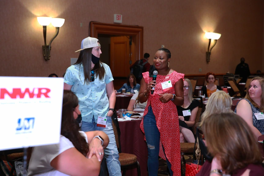 Answering questions at a meeting of NWIR
